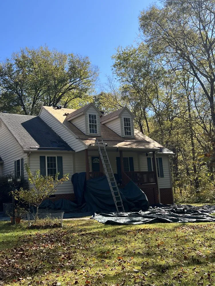 Slide of Velasquez Roofing