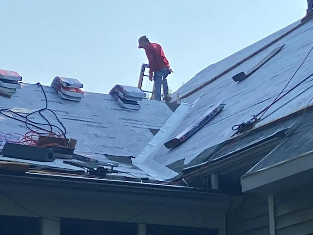 Slide of Velasquez Roofing