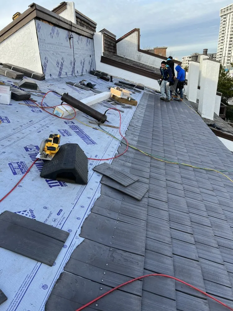 Slide of Velasquez Roofing