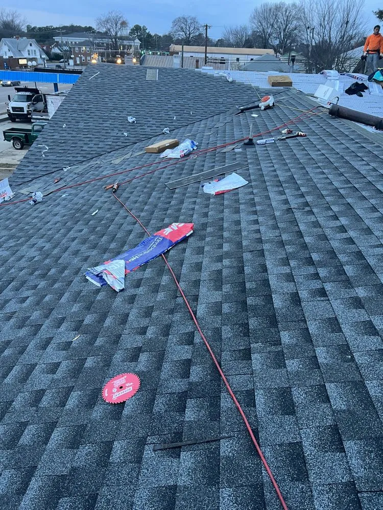 Slide of Velasquez Roofing