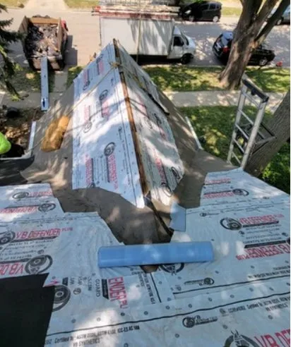 Slide of Velazquez Roofing & Gutters