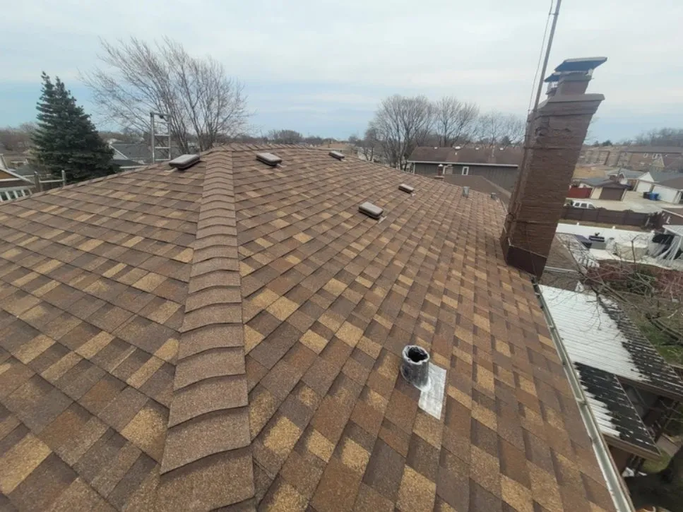 Slide of Velazquez Roofing & Gutters