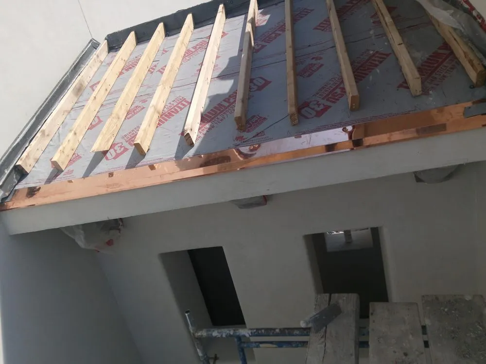 Slide of Ventov Roofing