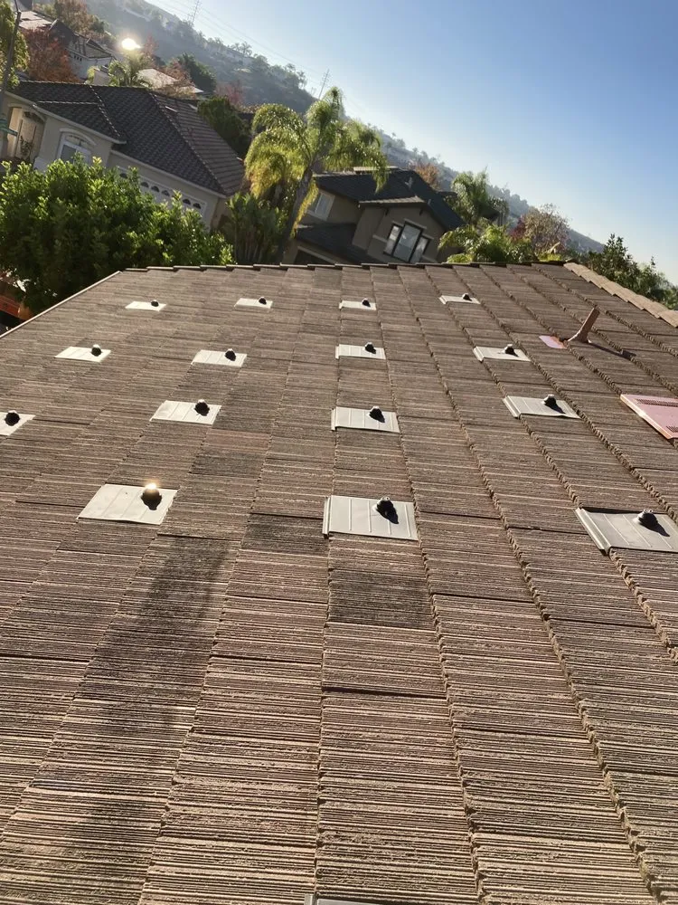 Slide of Venture Roofing