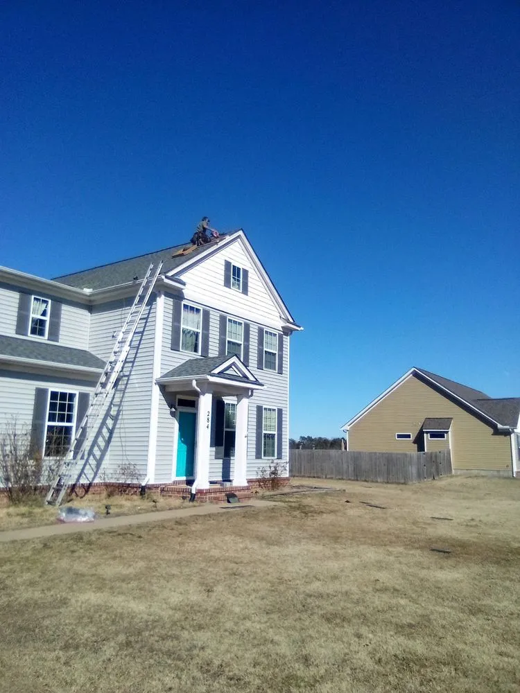 Slide of Venture Roofing