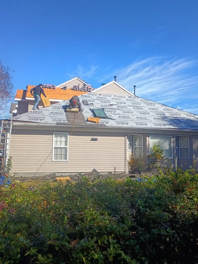 Slide of Venture Roofing