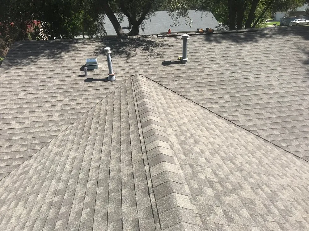 Slide of Veritas Roofers