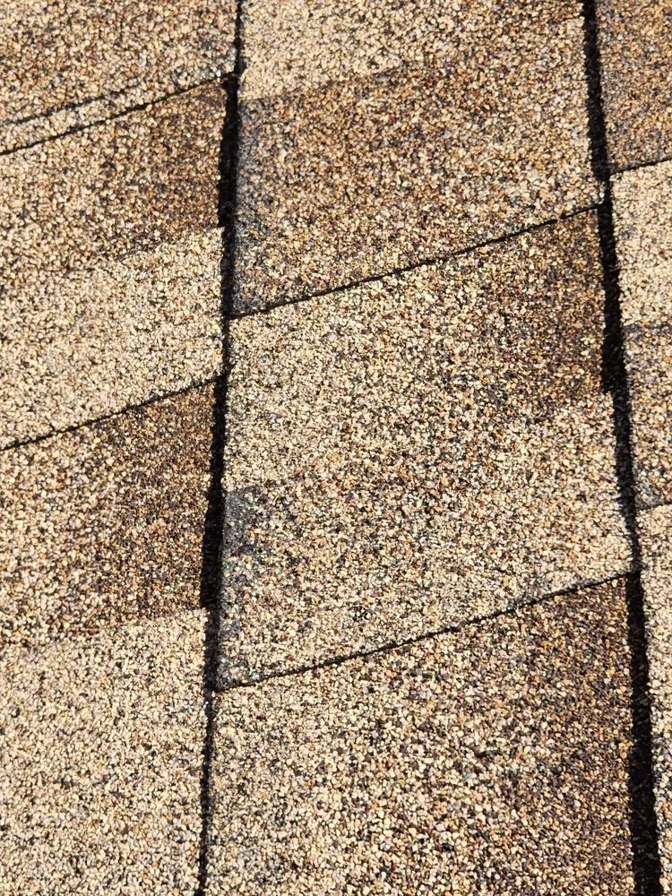 Slide of Veritas Roofers