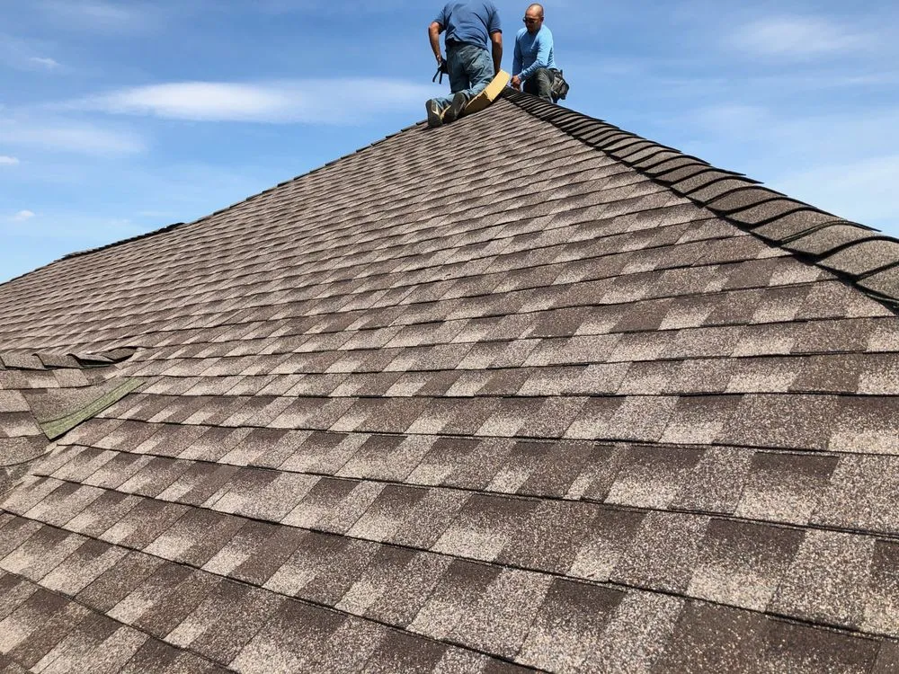 Slide of Veritas Roofing