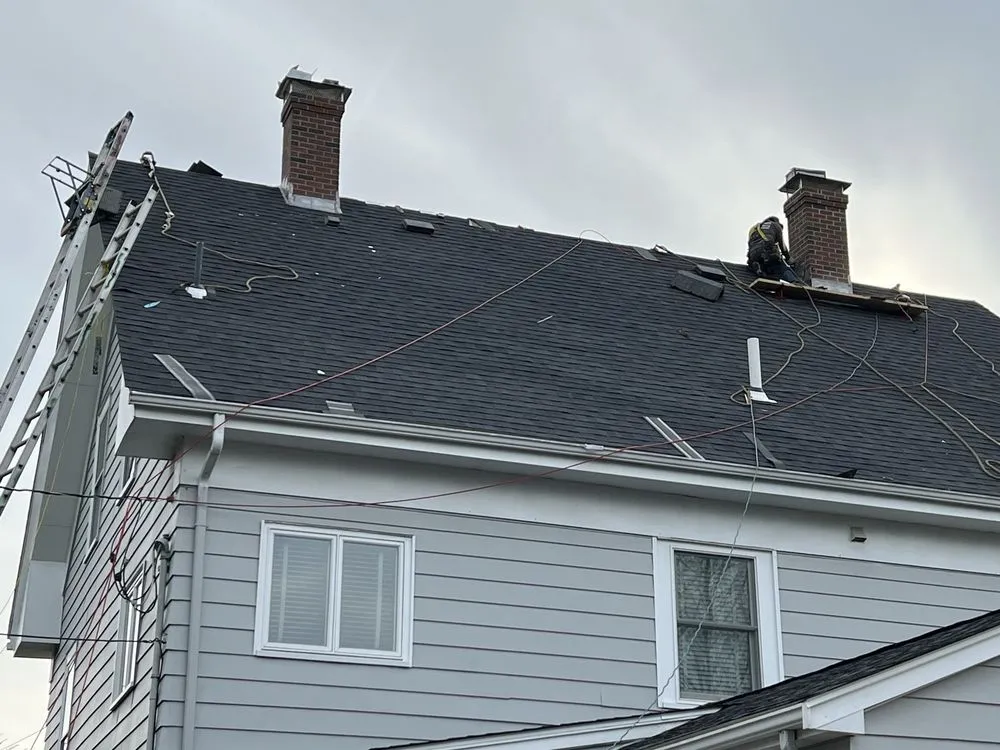 Slide of Veritas Roofing