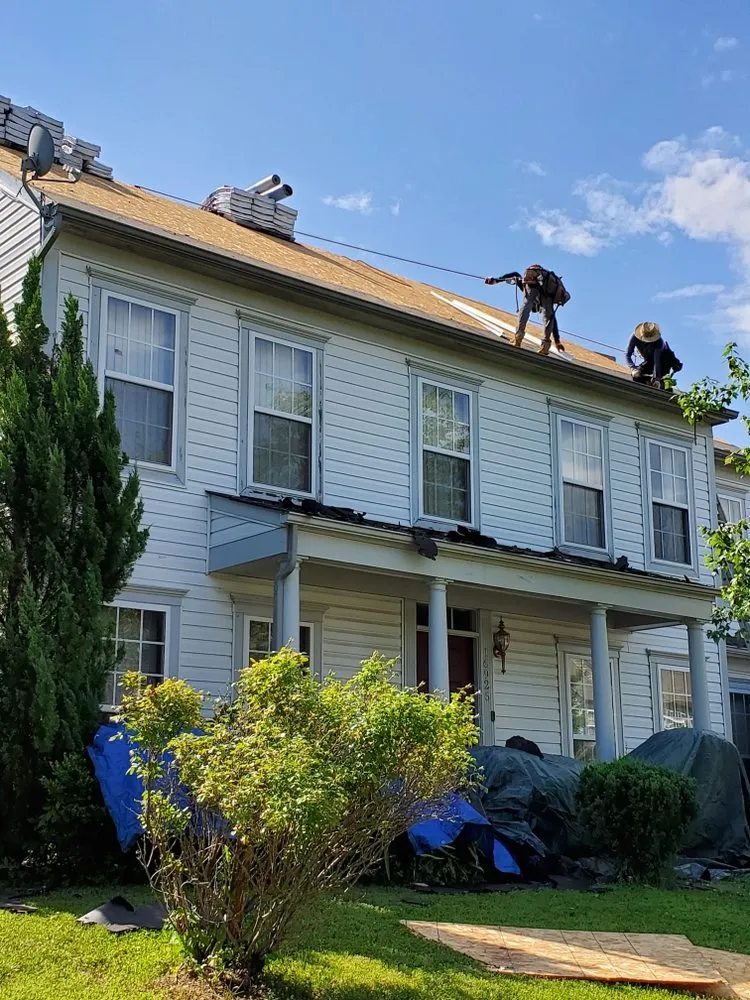 Slide of Vertex Roofing Contractors