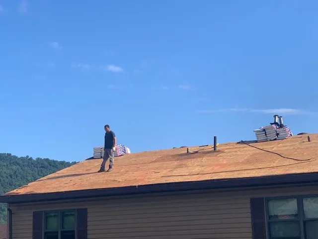 Slide of Vertex Roofing Contractors