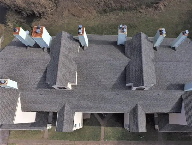 Slide of Vertex Roofing