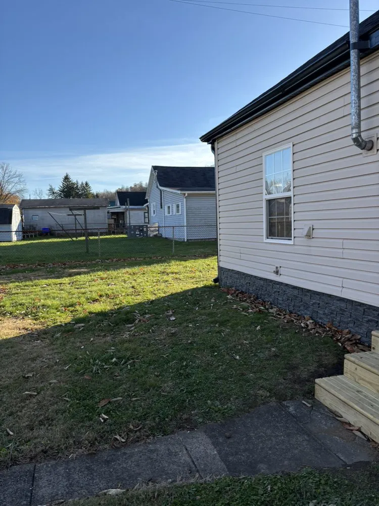 Expert metal roofing installation for residential properties in Tunnelton, WV by Vest Construction