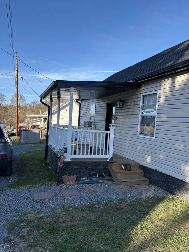 Expert storm damage roof repair in Tunnelton, WV by Vest Construction