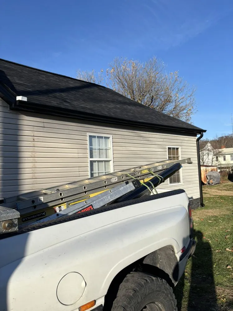 Local residential roofing service with free inspection in Tunnelton, WV by Vest Construction