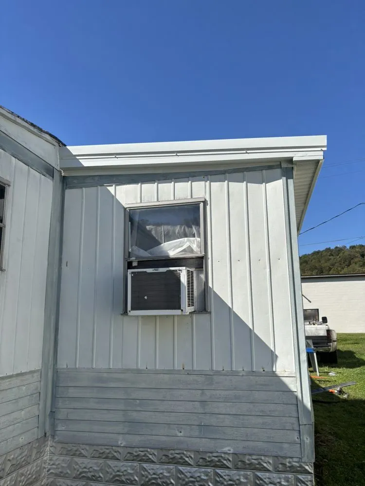 Professional residential roofing service in Tunnelton, WV by Vest Construction