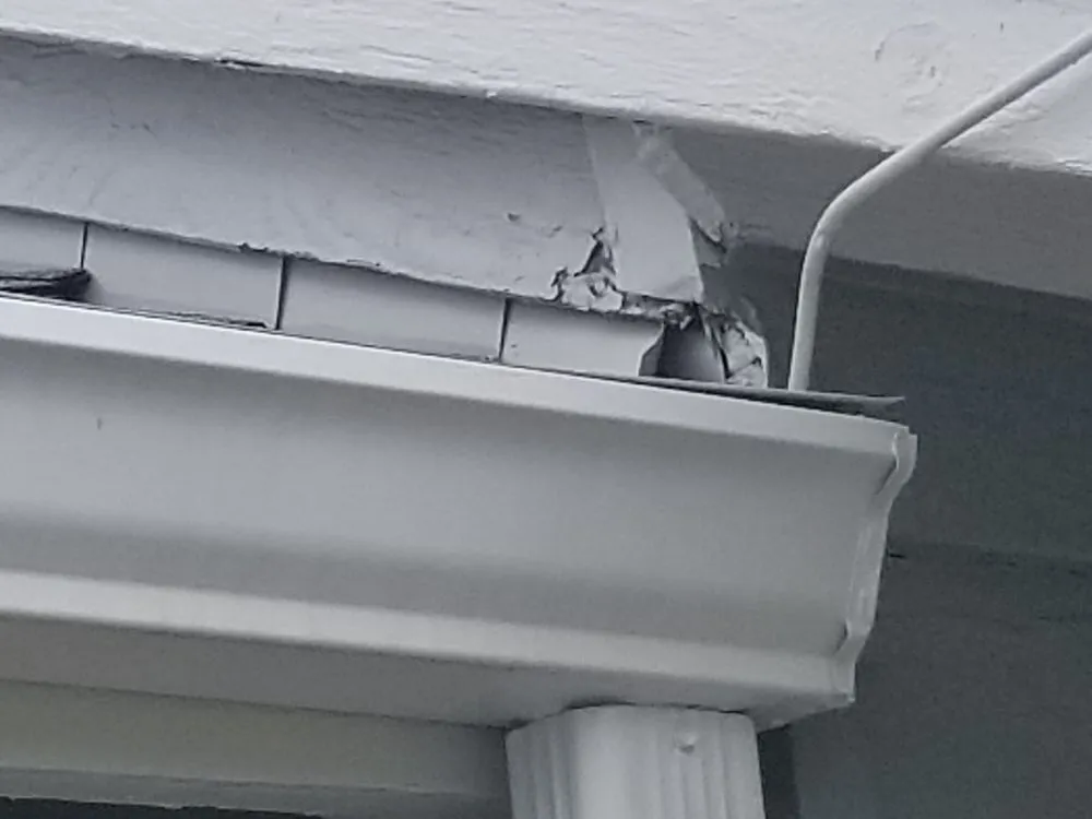 Slide of Veteran Roofing