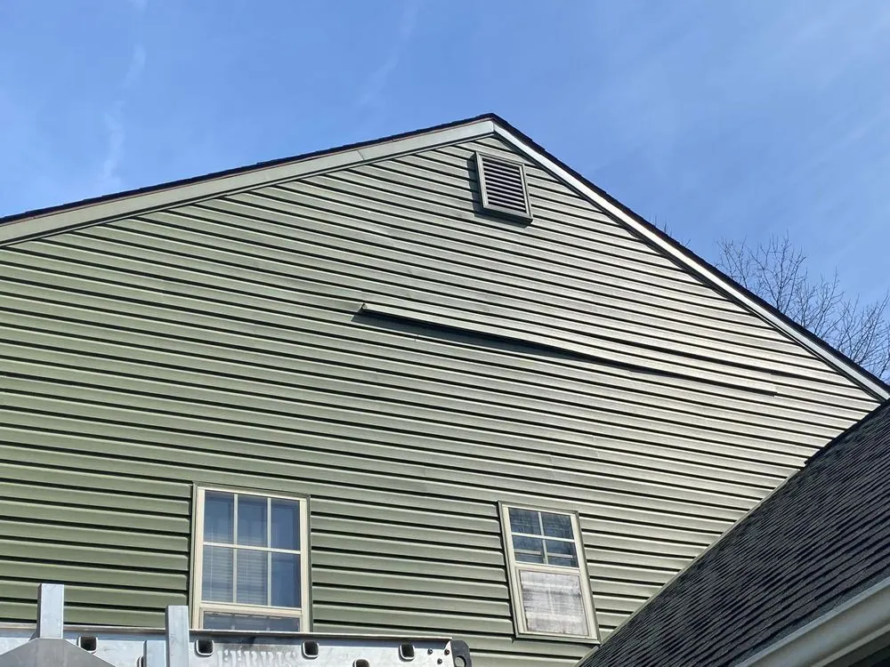 Slide of Veteran Roofing