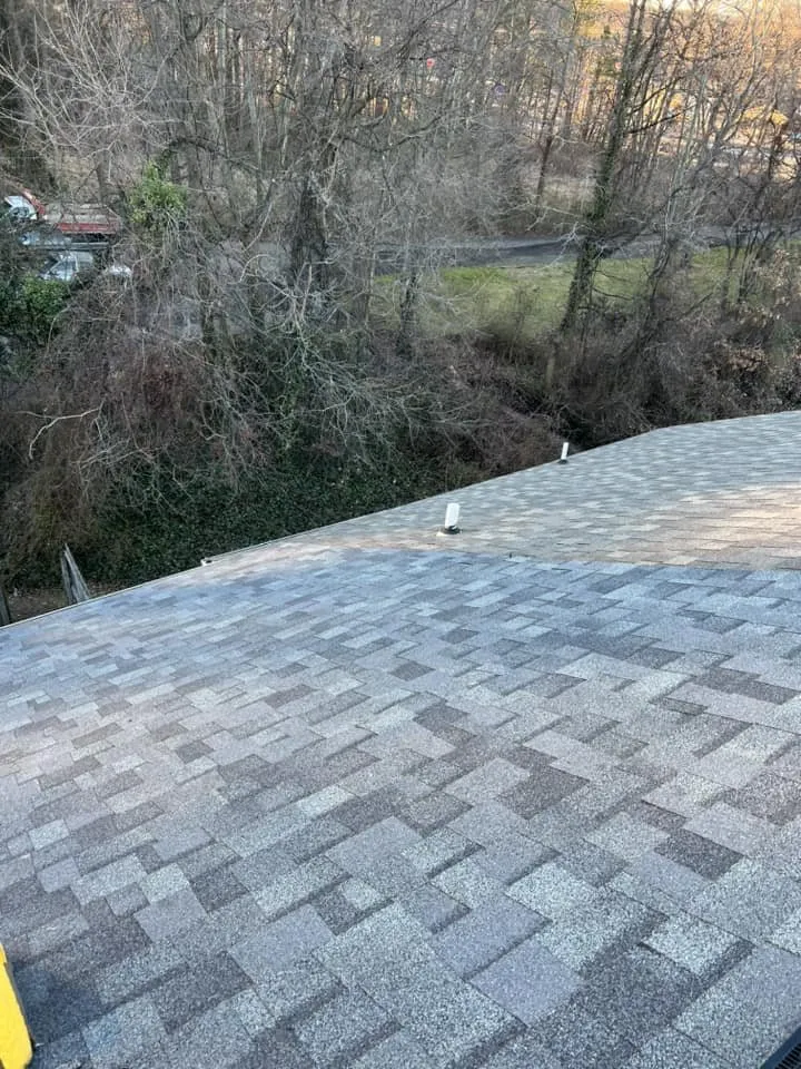 Slide of Veteran Roofing