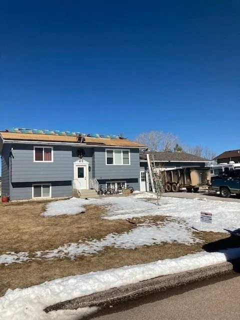 Slide of Veteran Roofing