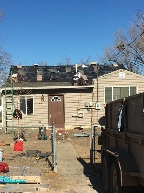 Slide of Veteran Roofing