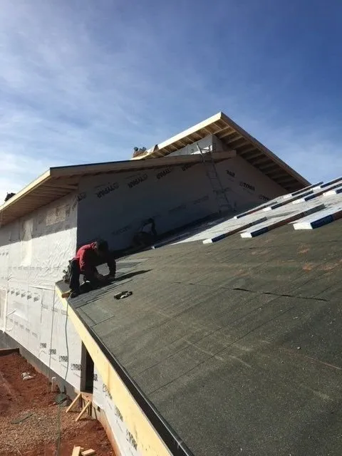 Slide of Veteran Roofing