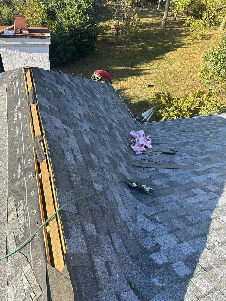 Slide of Veterans Roofing & Restoration