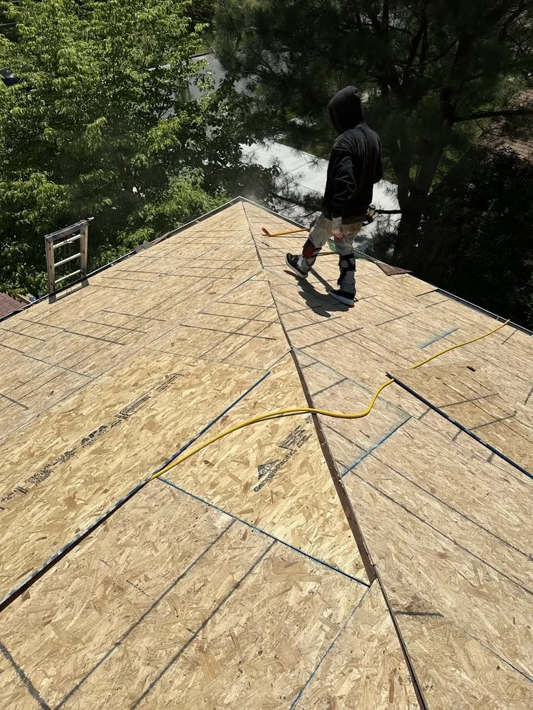 Slide of Veterans Roofing & Restoration