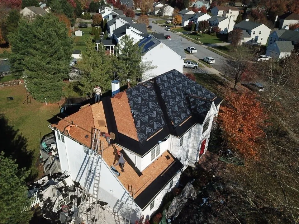 Slide of Veterans Roofing & Restoration
