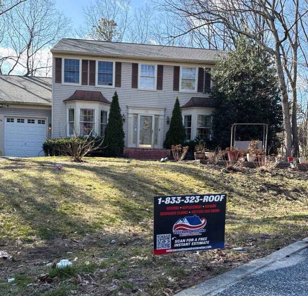 Slide of Veterans Roofing & Restoration