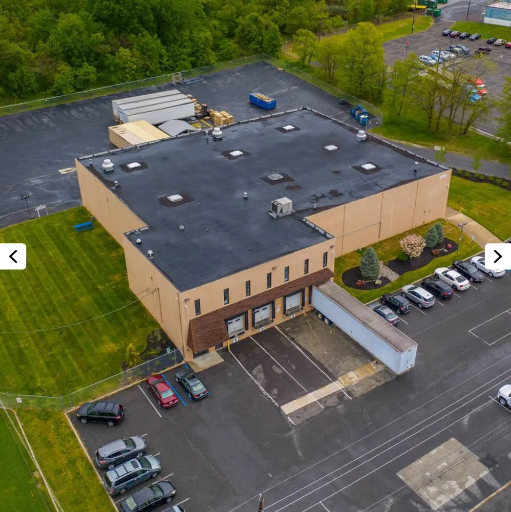 Slide of Veterans Roofing & Restoration