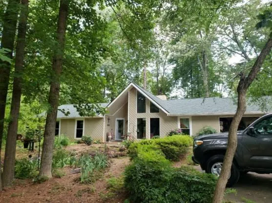 Slide of Veteran's Roofing Company