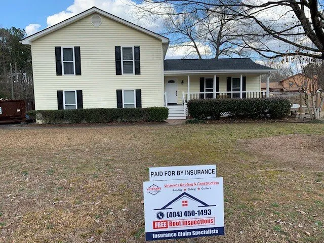 Slide of Veteran's Roofing Company