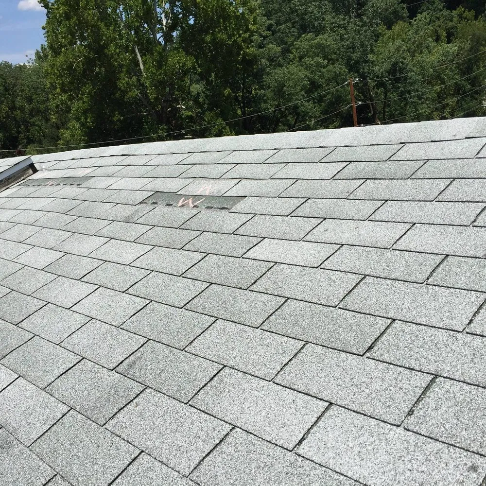 Slide of Veterans Roofing Restoration