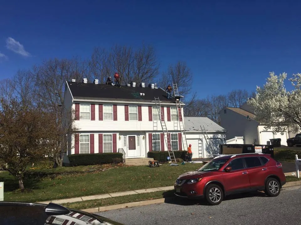 Slide of Veterans Roofing Restoration