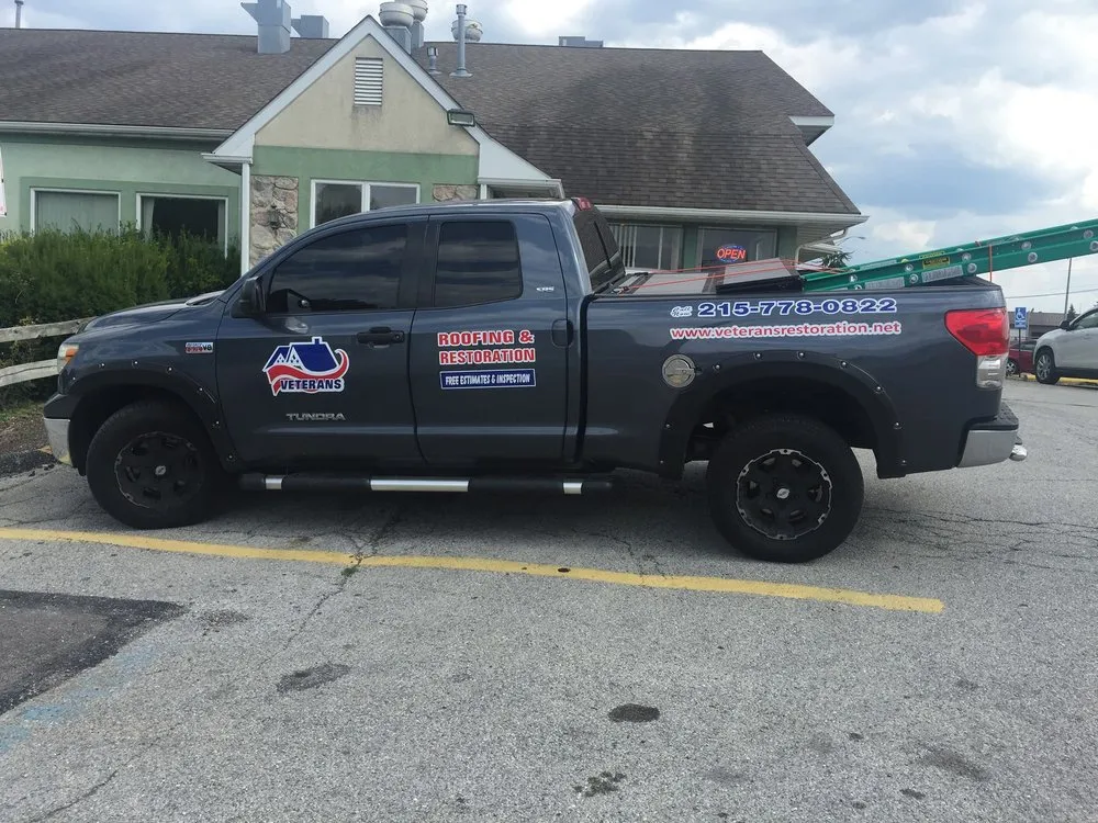 Slide of Veterans Roofing Restoration