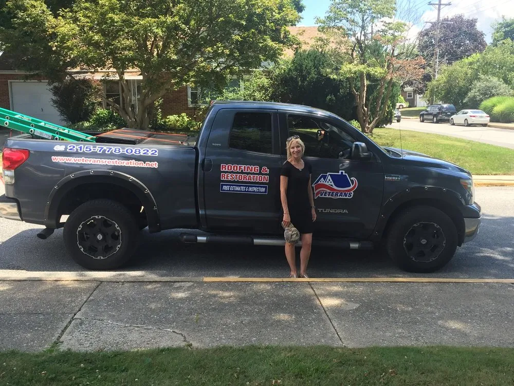 Slide of Veterans Roofing Restoration