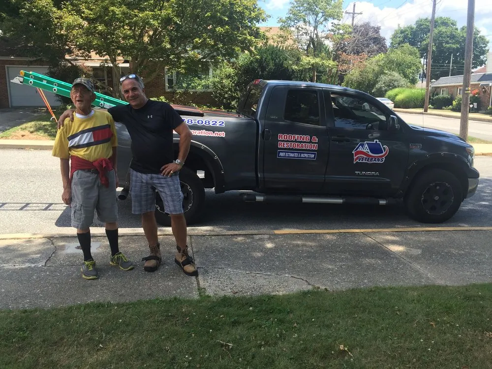 Slide of Veterans Roofing Restoration
