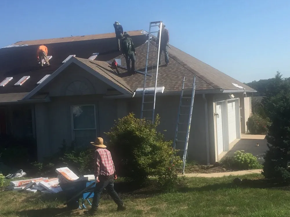 Slide of Veterans Roofing Restoration