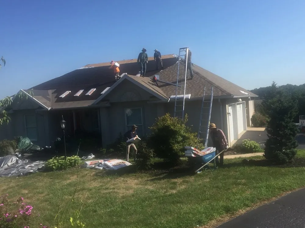 Slide of Veterans Roofing Restoration