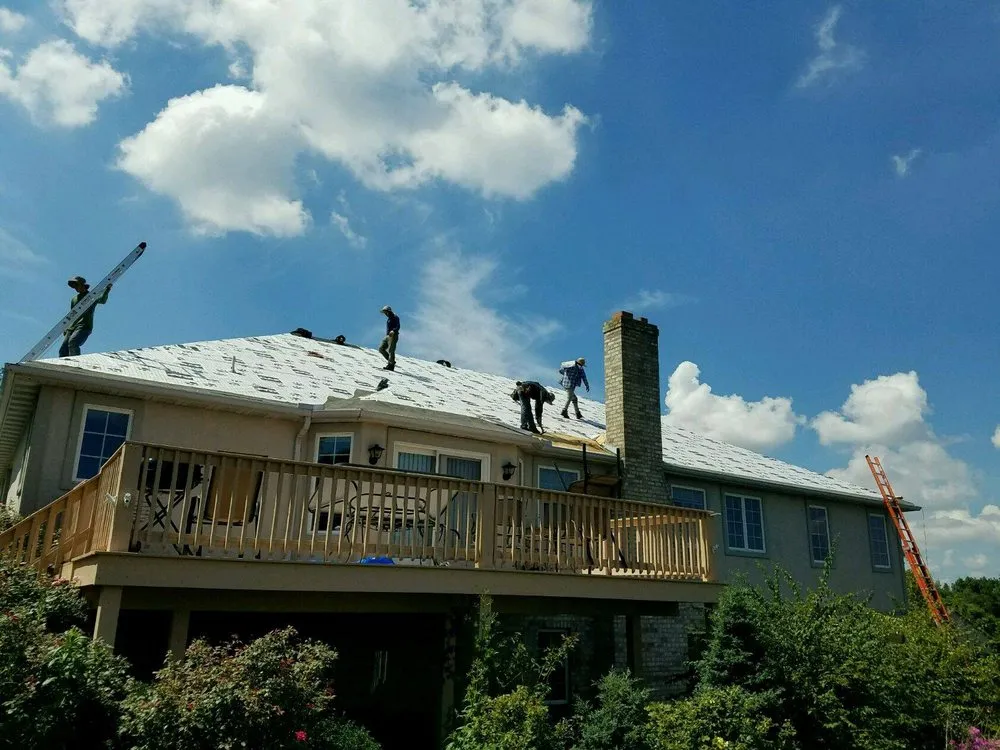 Slide of Veterans Roofing Restoration