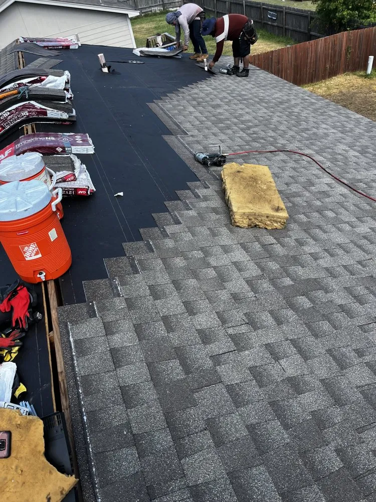 Slide of VG Roofing Service