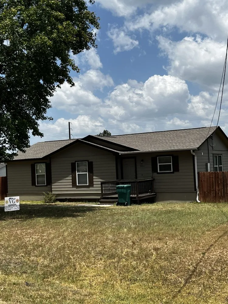 Slide of VG Roofing Service