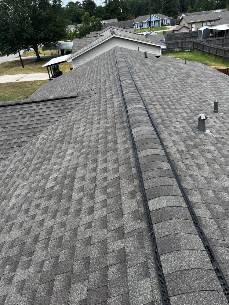 Slide of VG Roofing Service