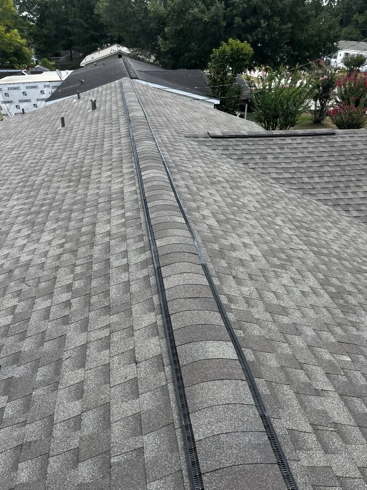Slide of VG Roofing Service