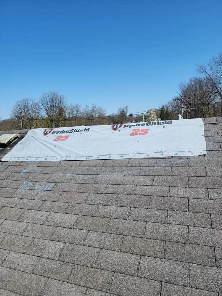 Slide of Victory Roofing and Restoration