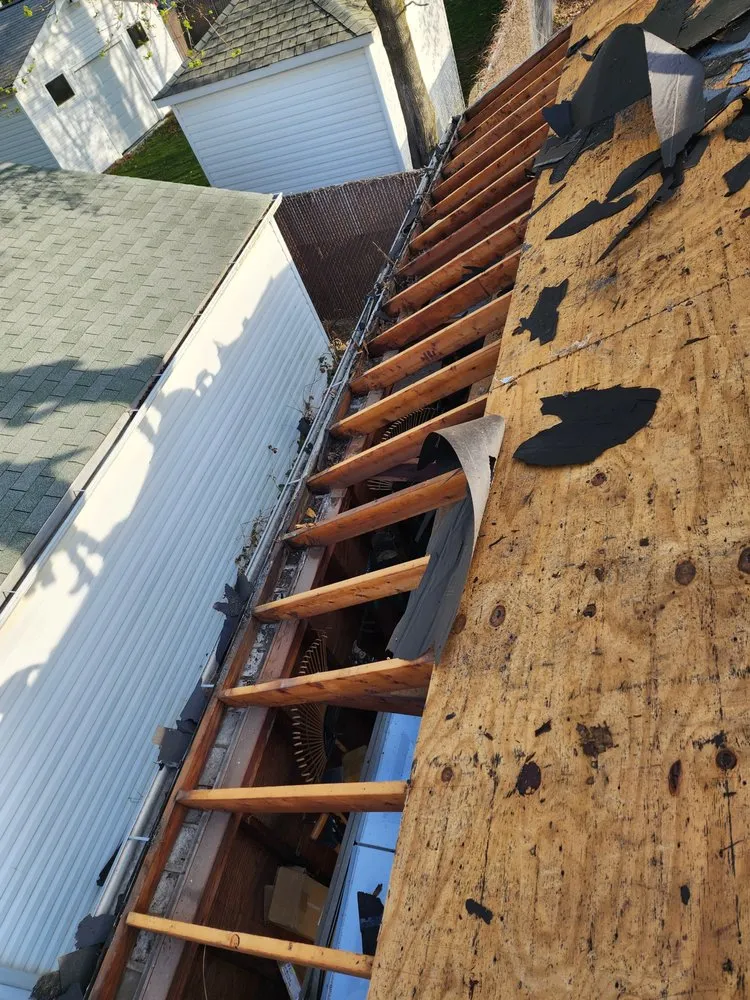 Slide of Victory Roofing and Restoration