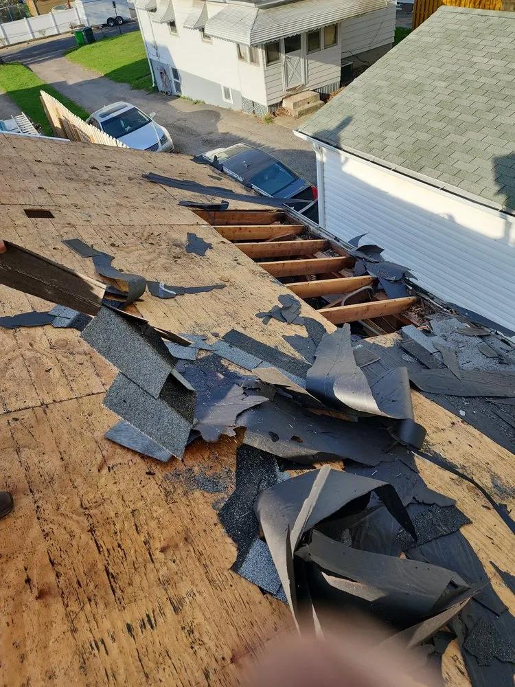 Slide of Victory Roofing and Restoration