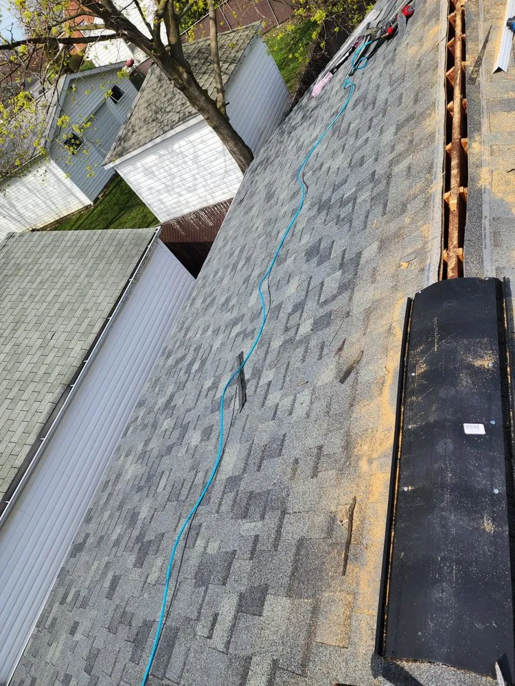 Slide of Victory Roofing and Restoration